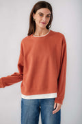 Rust crewneck pullover front view, long sleeves, white hem band