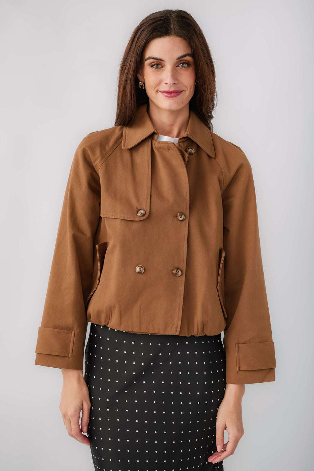 Brown cropped trench jacket front view with point collar and double-breasted closure