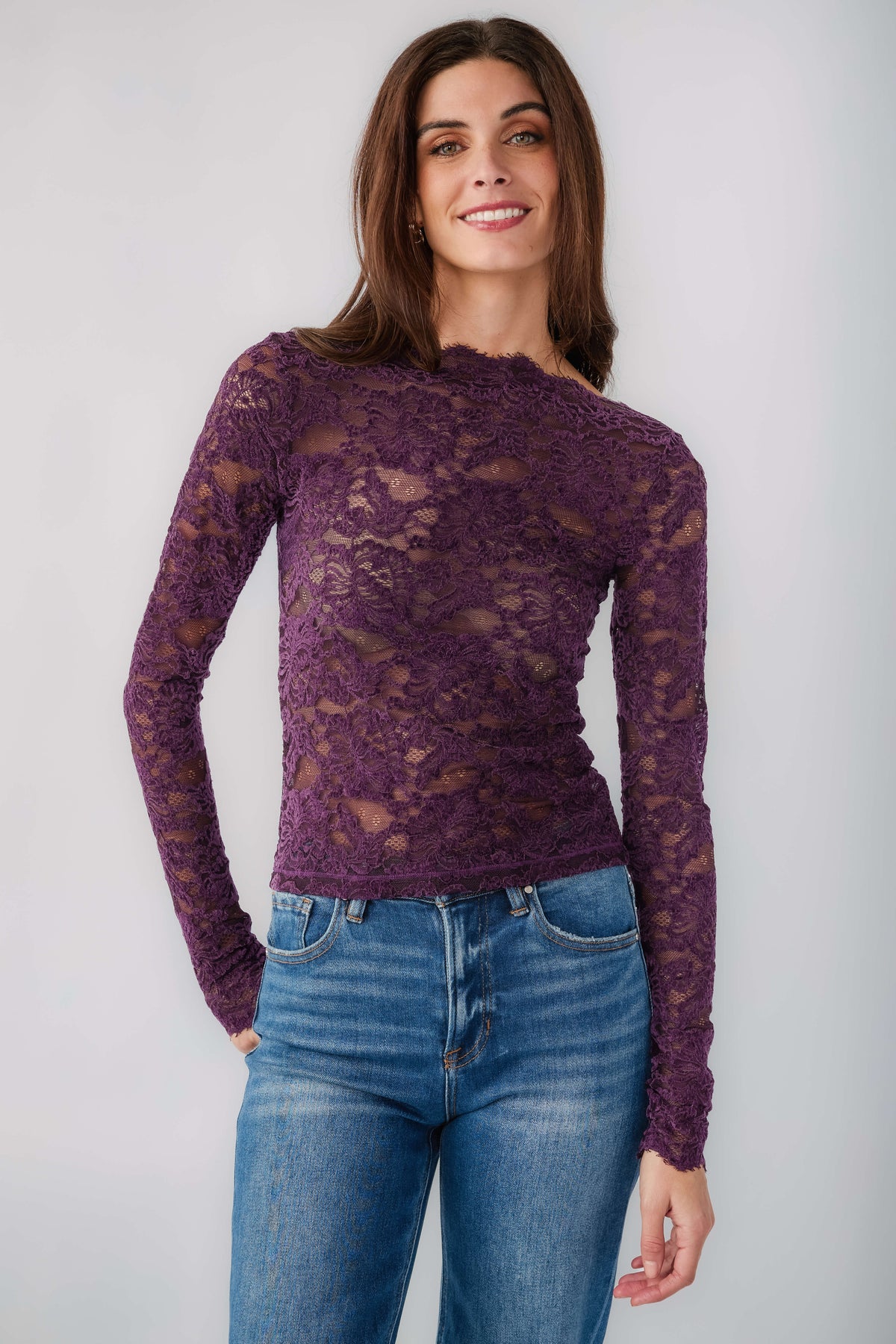 Plum lace long-sleeve top with crew neckline and fitted silhouette