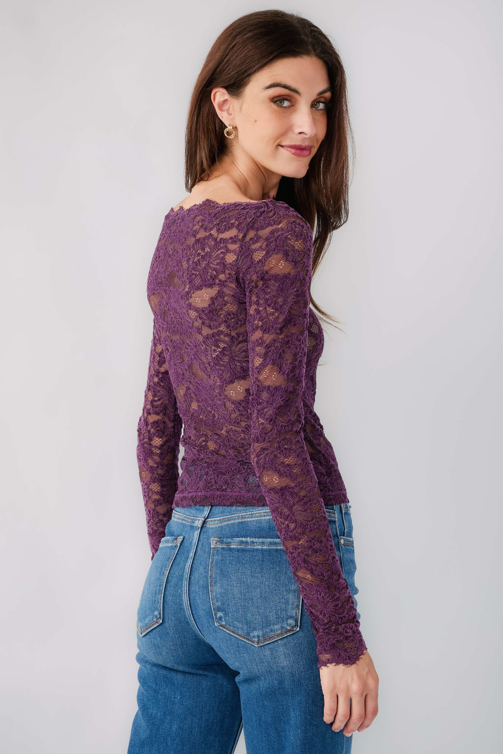 Plum lace long-sleeve top with crew neckline, sheer lace back and fitted hem