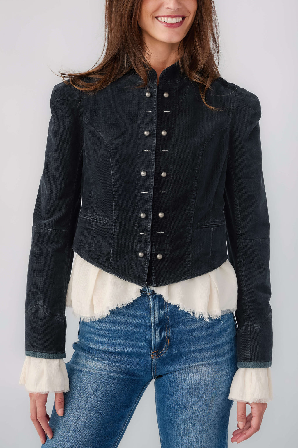 Black denim blazer with brass button front and white ruffled cuffs
