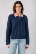 Navy knit sweater with striped pink-red collar and button placket, long sleeves