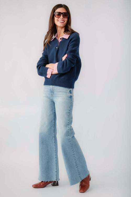 Navy knit sweater with striped collar and cuffs, long sleeves