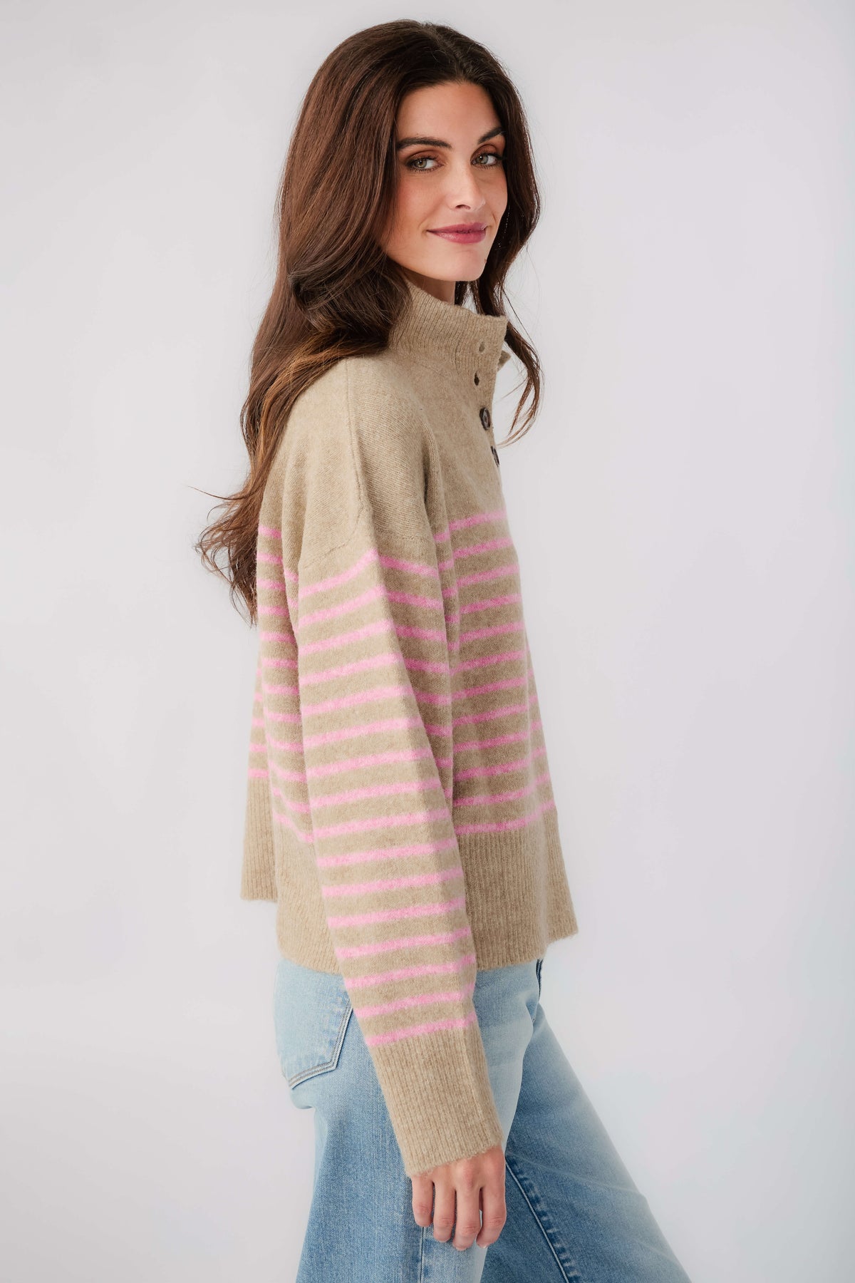 Mocha knit pullover with pink stripe pattern and half-button collar