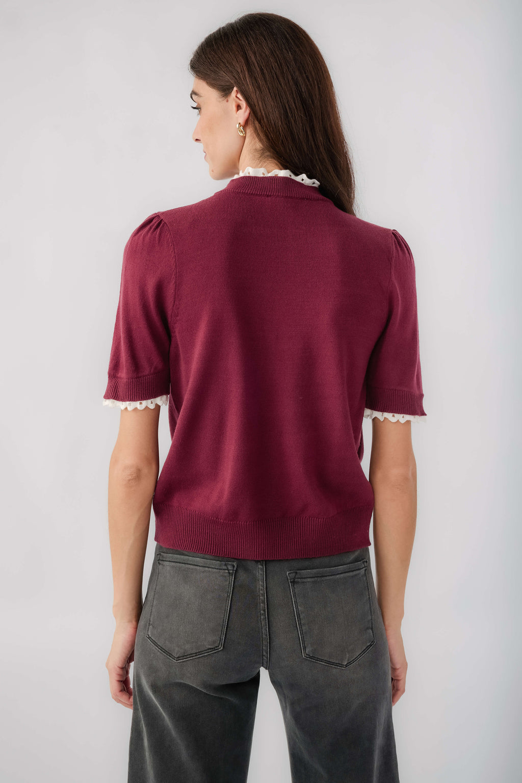 Wine knit mock-neck top with lace-trim sleeves, back view