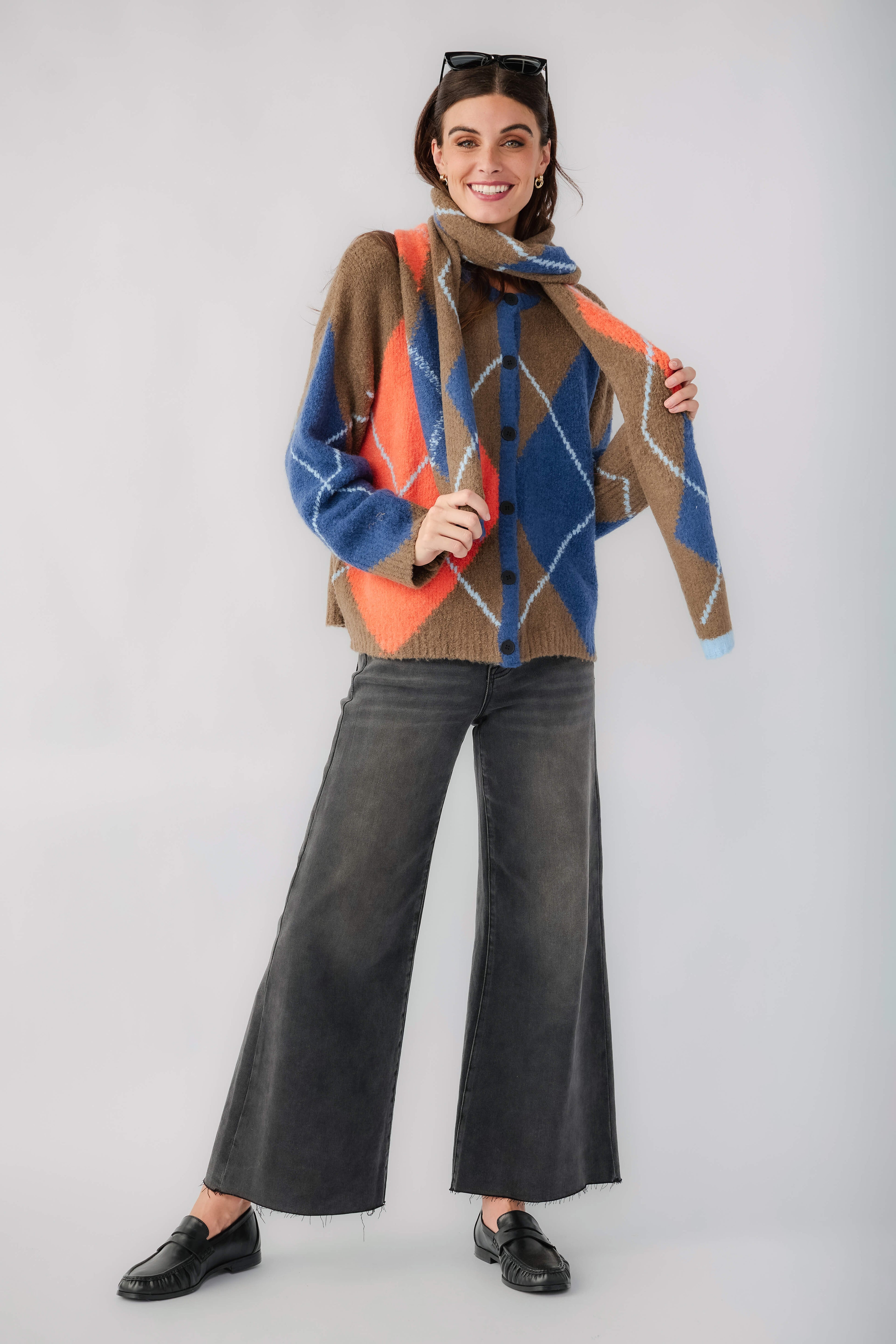 Kaki plaid scarf with blue and orange diamond pattern, hanging long