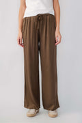 Olive satin wide-leg pants with elastic drawstring waist and relaxed flowy legs