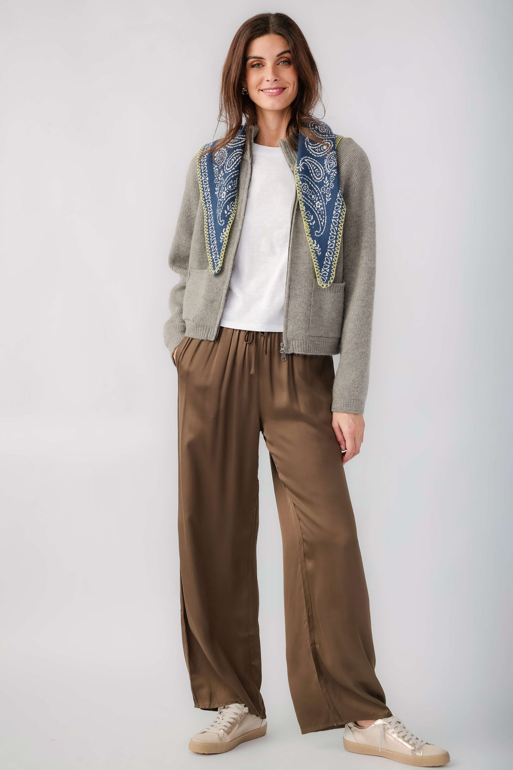Olive satin wide-leg pants with elastic drawstring waist, draped wide legs