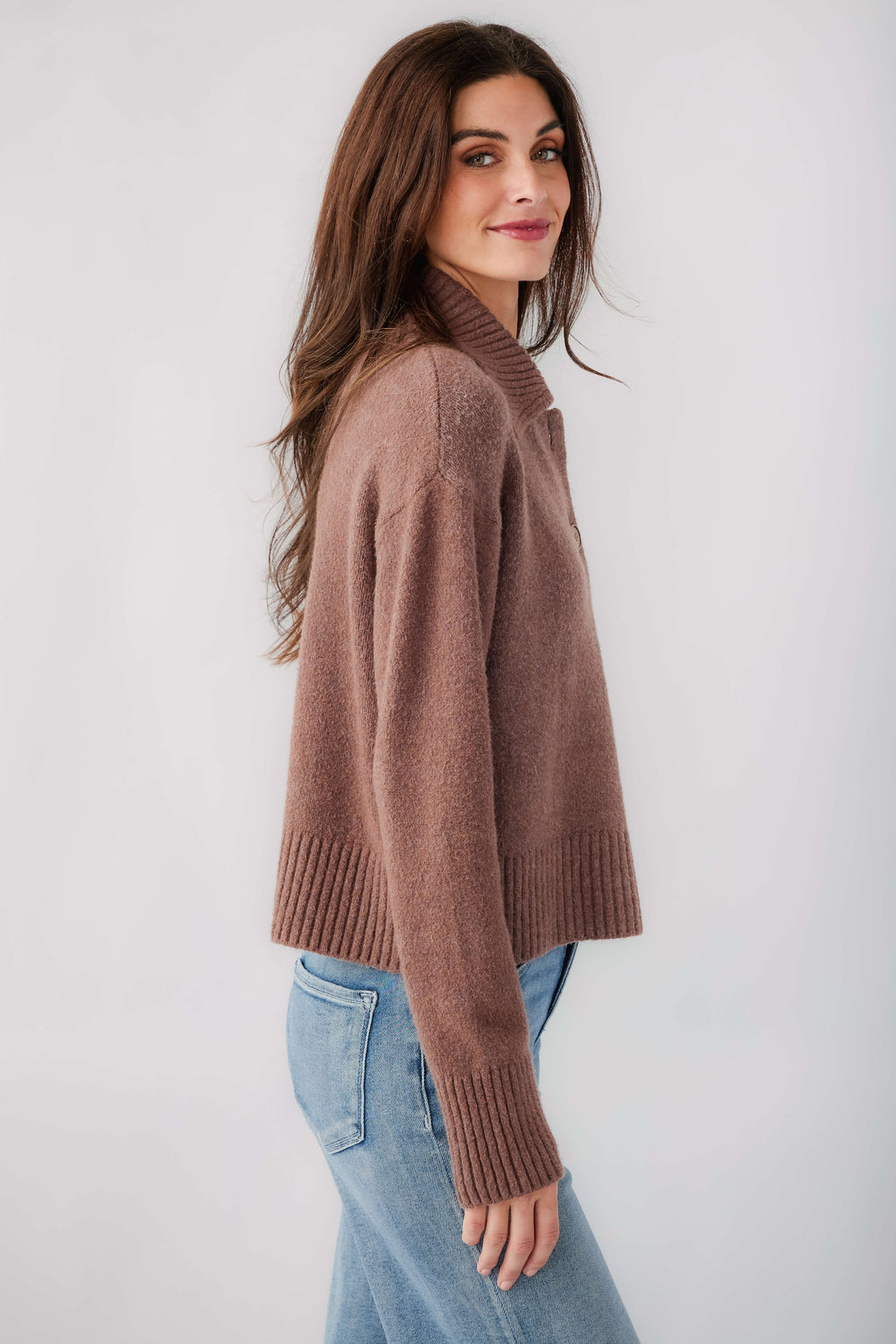 Brown knit polo sweater side view, turn-down collar and button placket, long sleeves