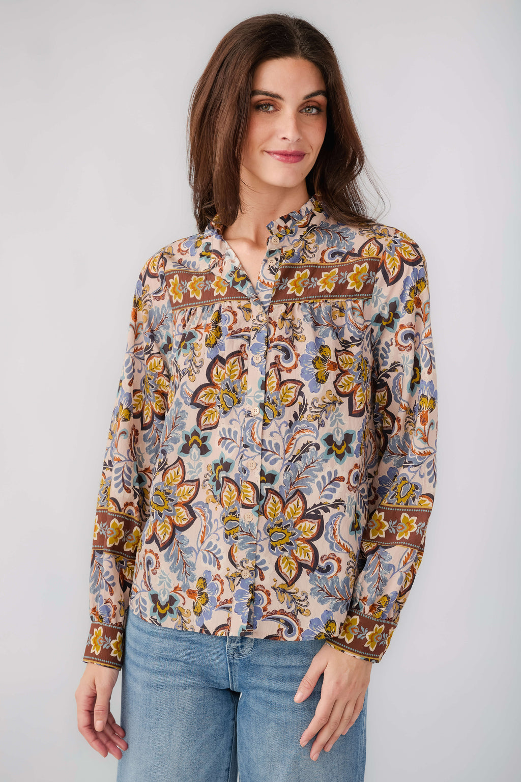 Beige border paisley button-down blouse with ruffled neckline and long sleeves