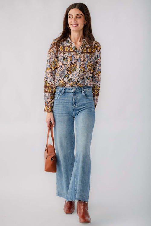 Beige printed ruffle-collar button-down blouse with long sleeves and border paisley print