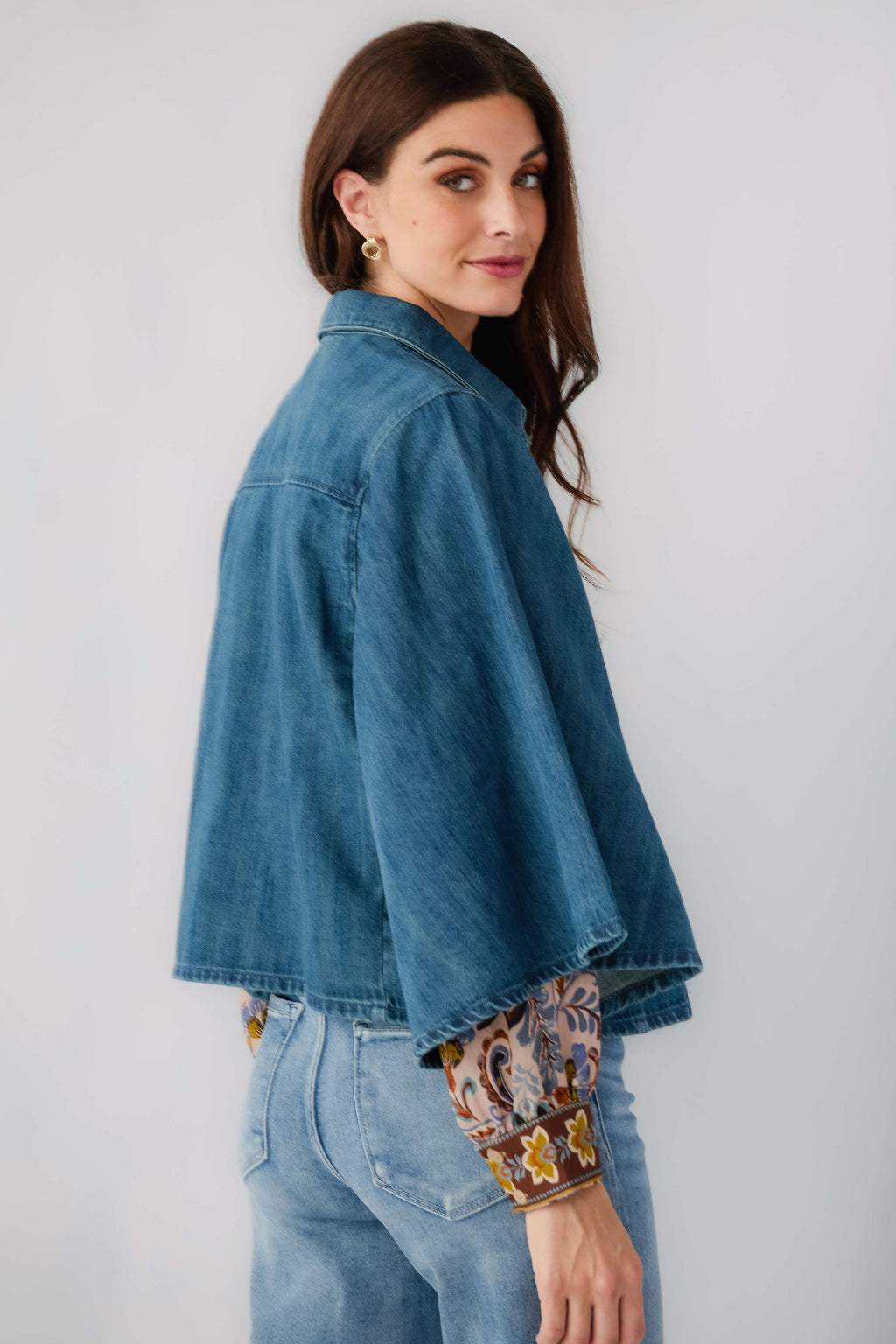 Denim kimono jacket, side/back view with flared hem and patterned cuff trim