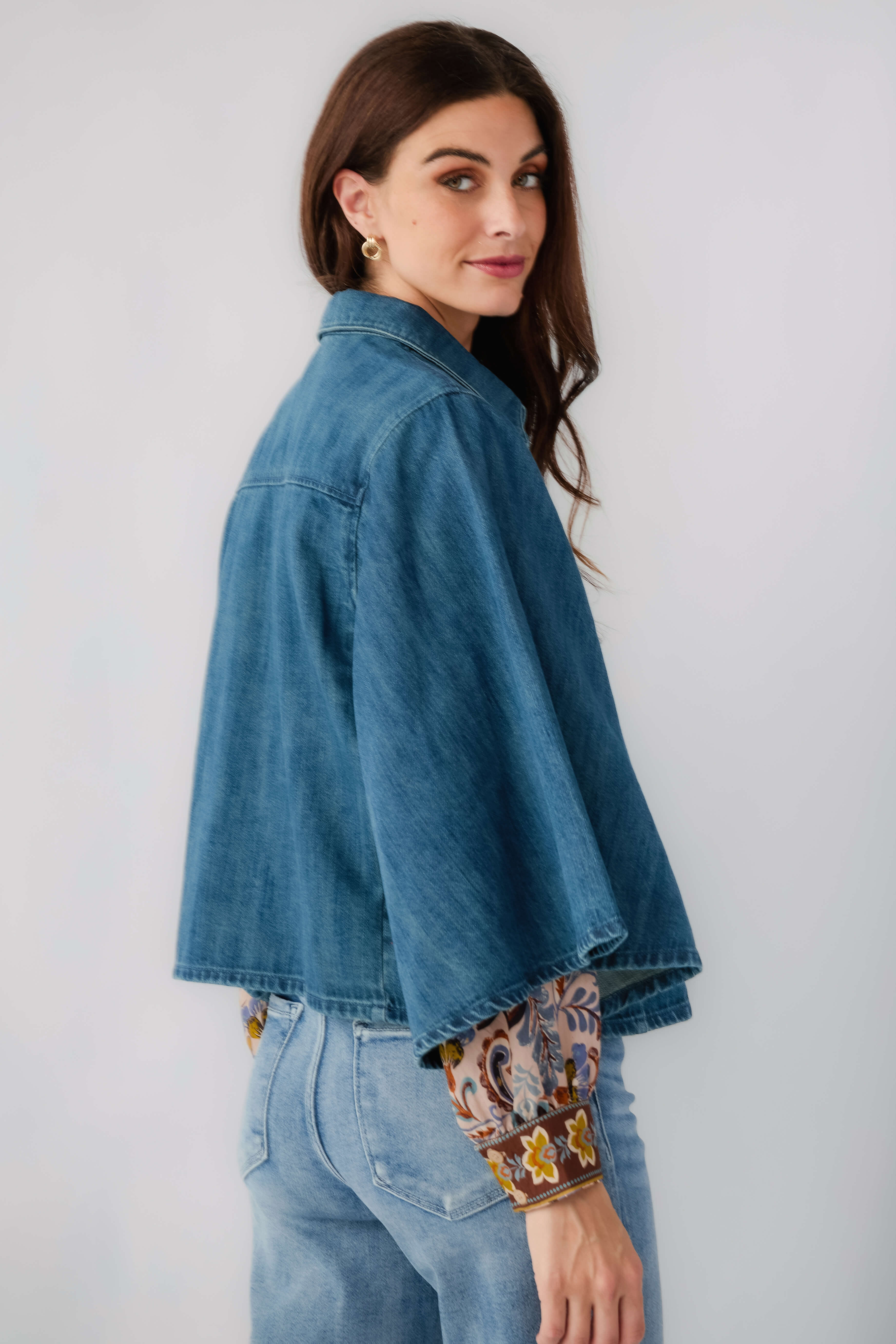 Denim kimono jacket, side/back view with flared hem and patterned cuff trim