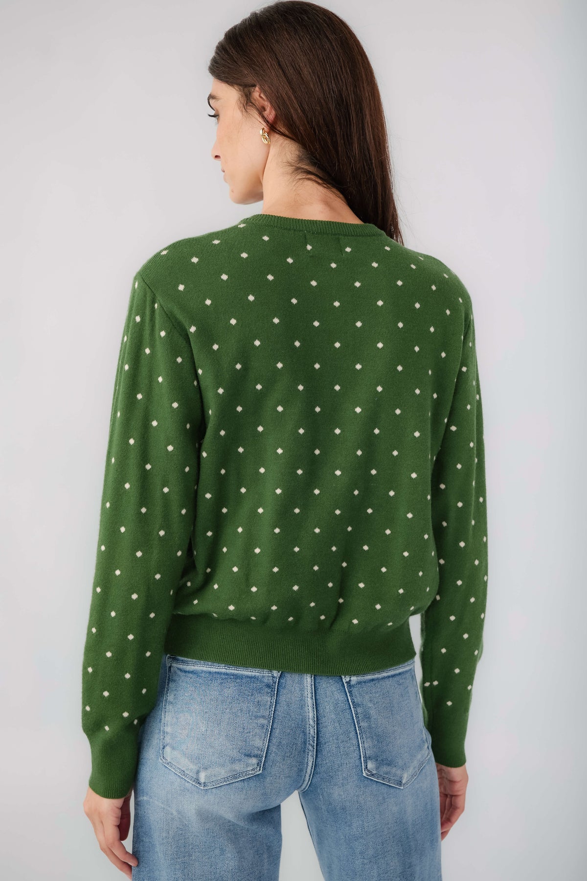 Green polka-dot cardigan back view with long sleeves and button placket