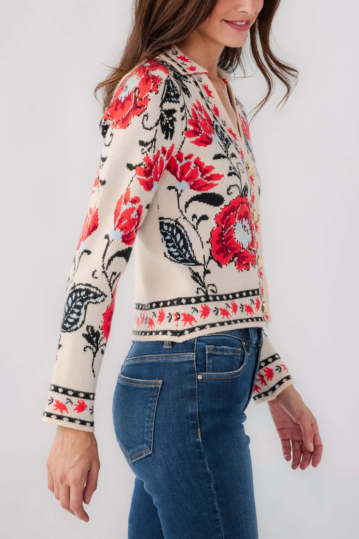 Cream floral cardigan with large red flowers and black leaves, long sleeves, button-front
