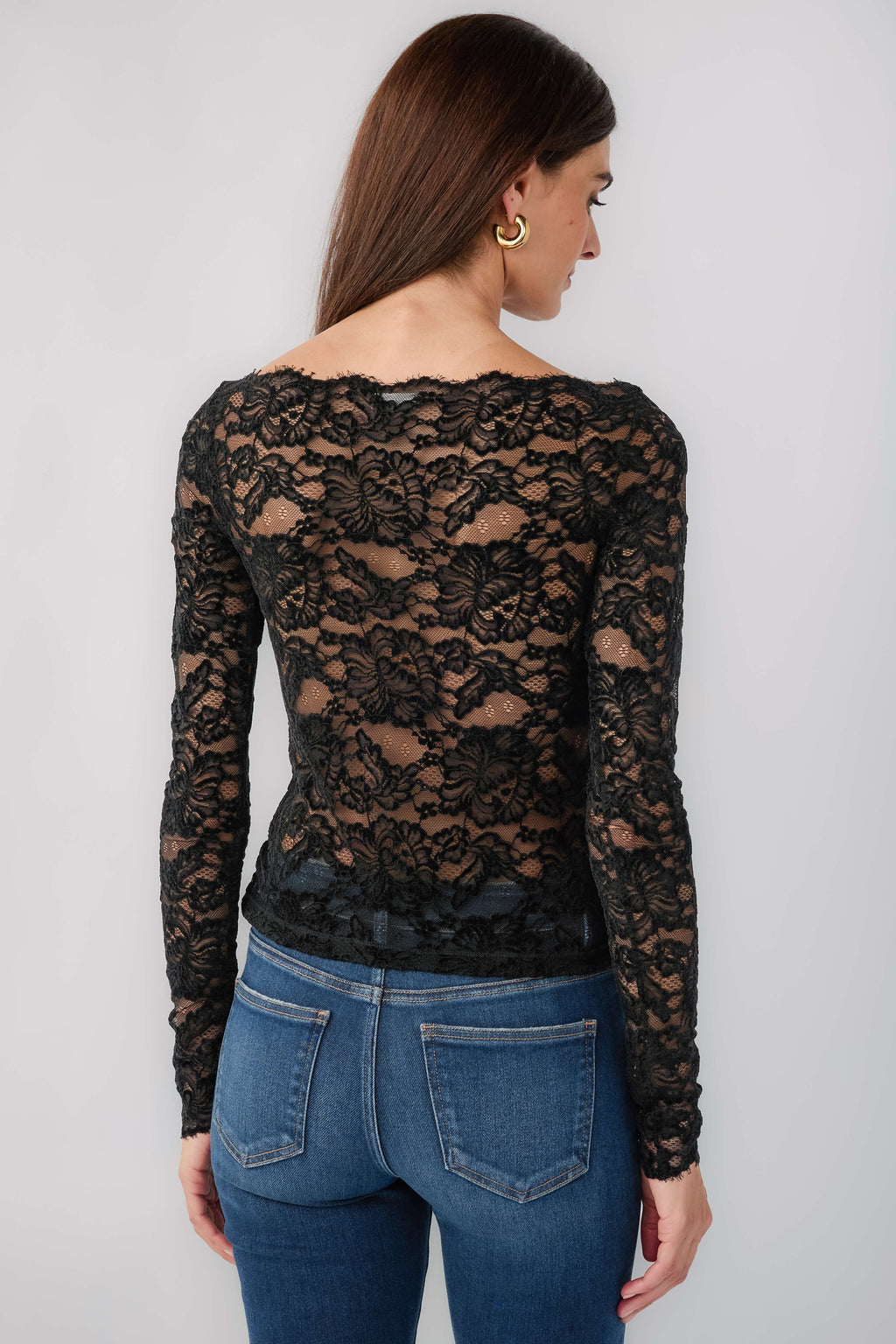 Black lace long-sleeve top with crew neckline, sheer back panel with floral texture
