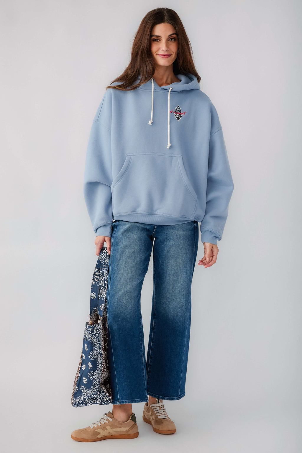 Light blue pullover hoodie with drawstring hood and front pouch pocket