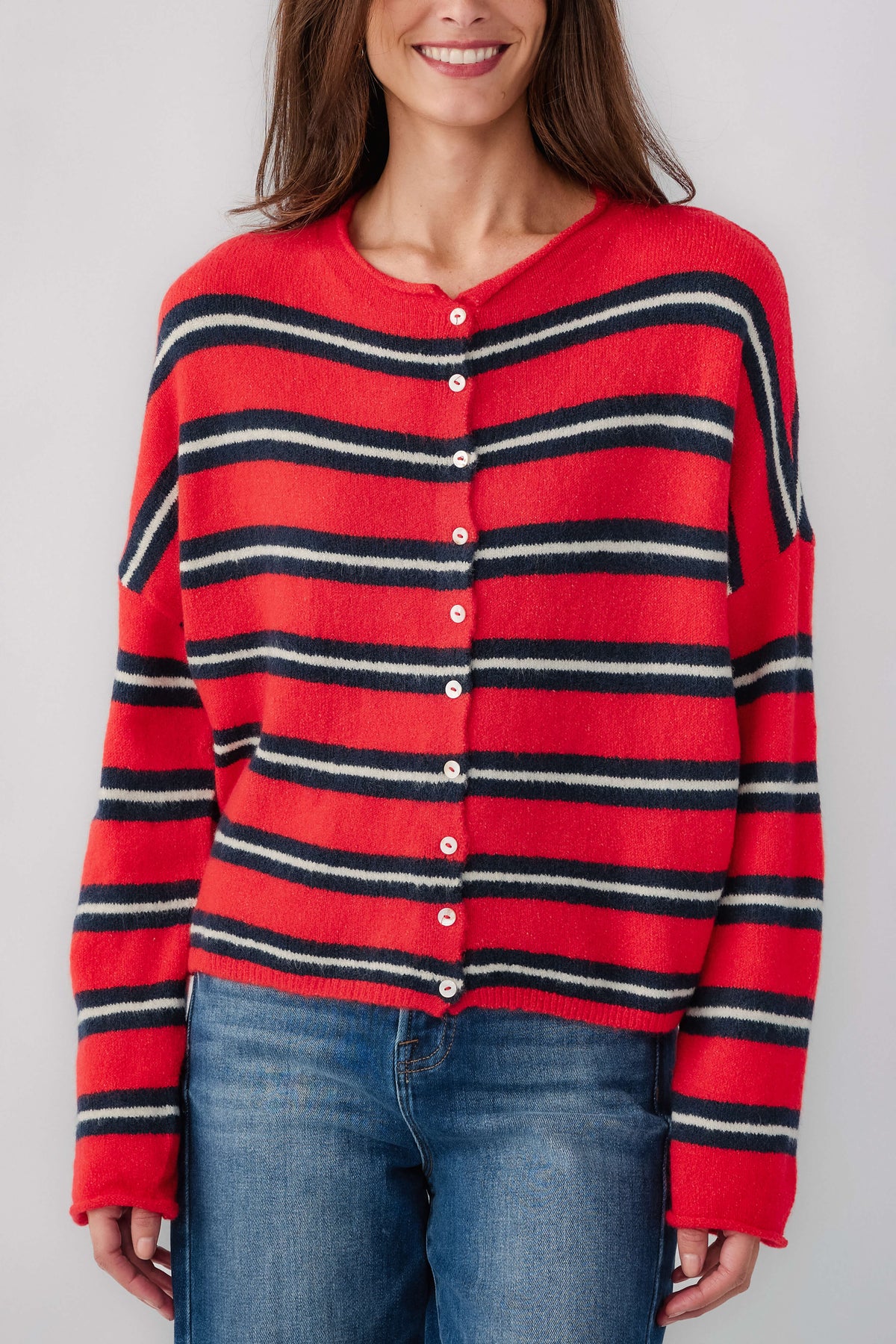 Women’s striped piper cardigan close-up: red crew neck, dark bands, button placket