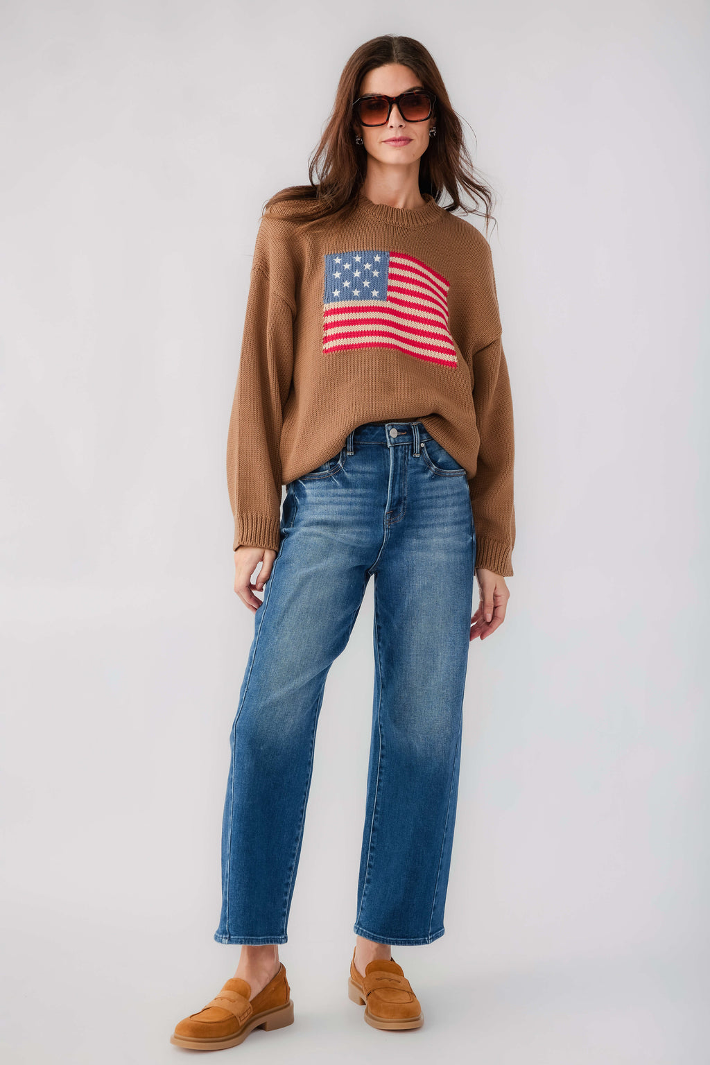 Olive brown crewneck sweater with American flag graphic across the chest