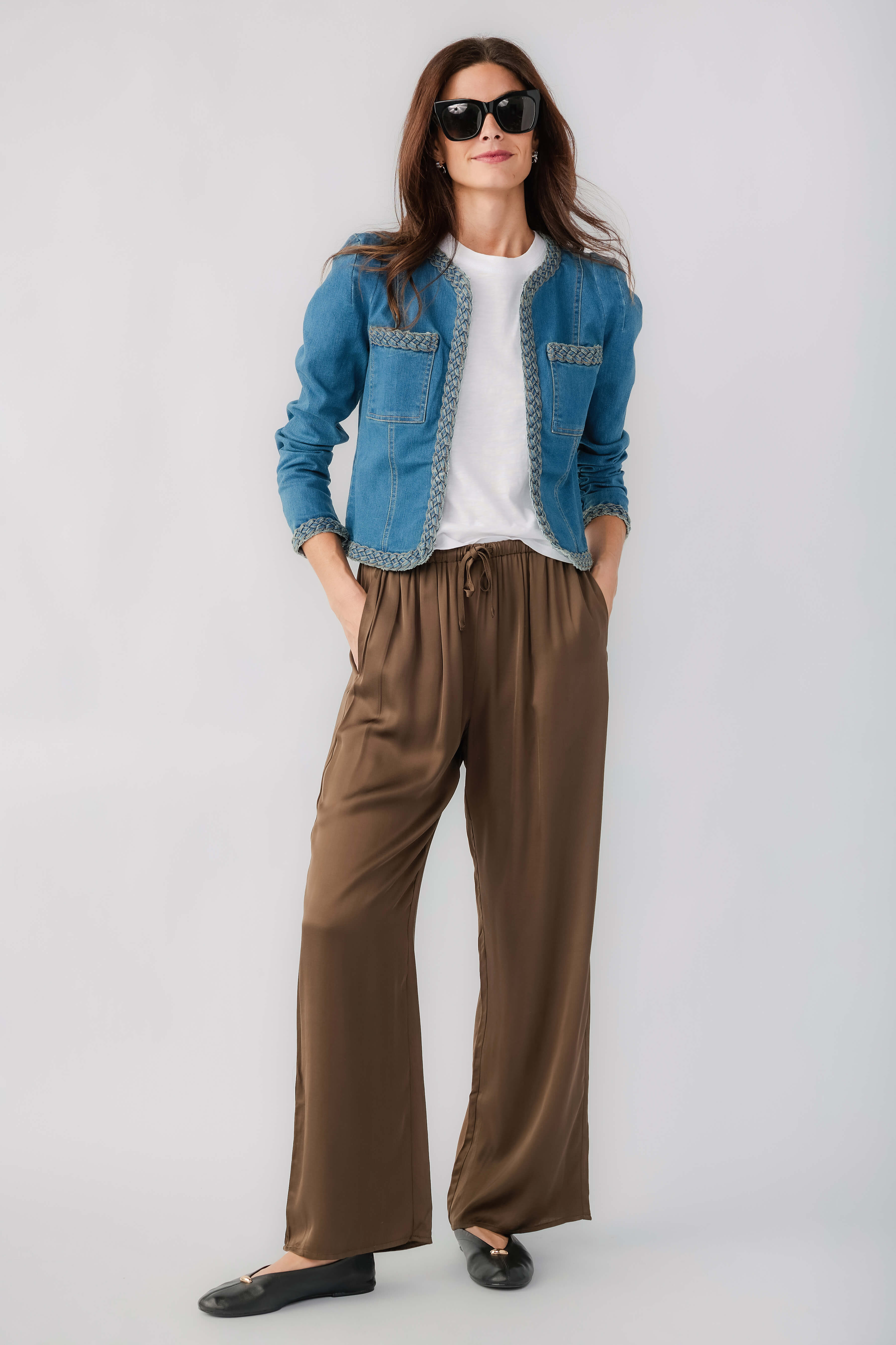 Olive satin wide-leg pants with elastic drawstring waistband and flowing wide legs