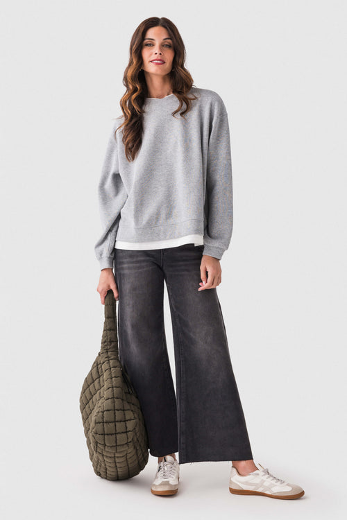Heather gray crewneck pullover sweater with long sleeves and ribbed cuffs