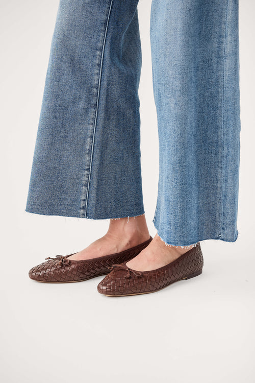 Brown woven ballet flats, side view showing textured upper and flat sole