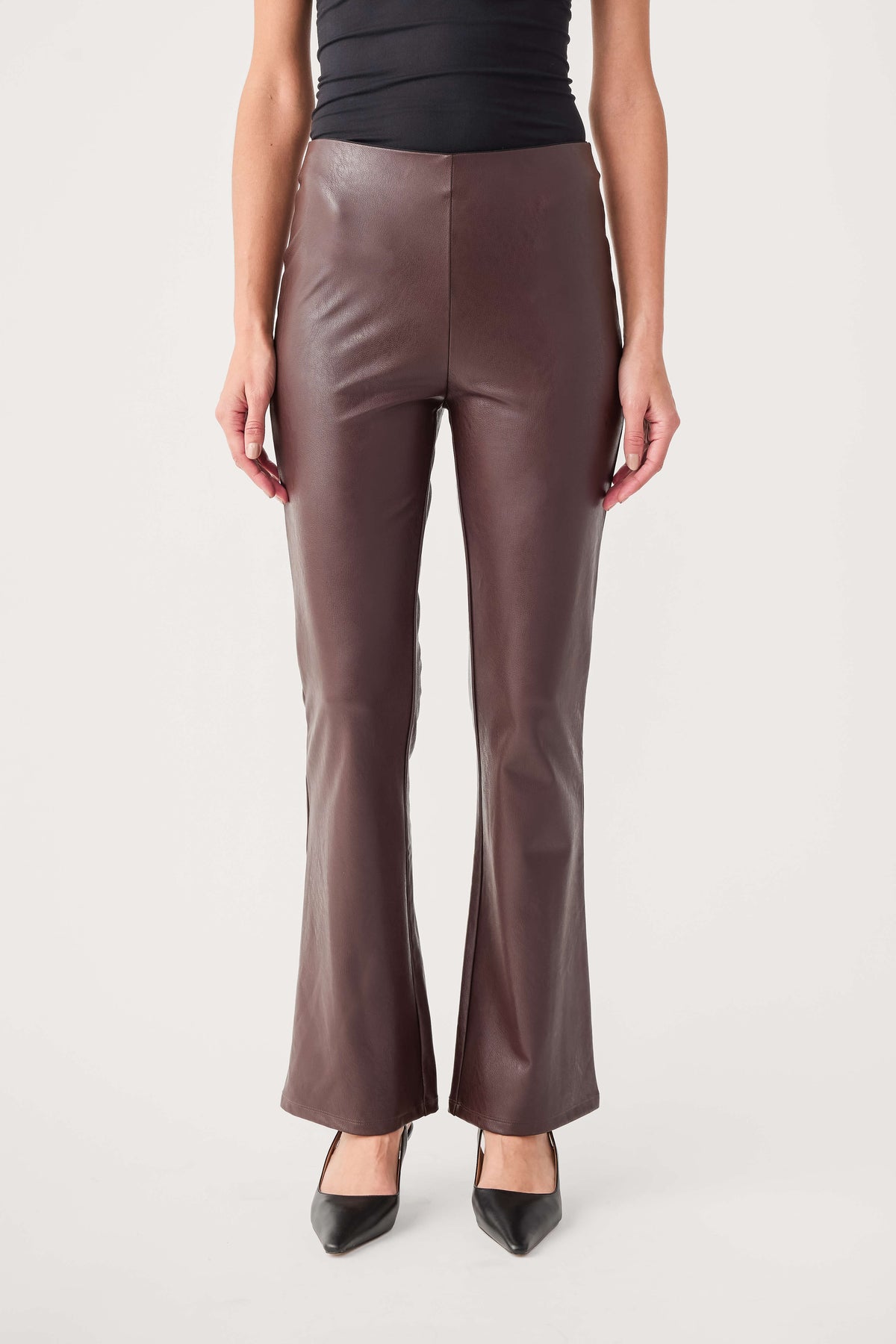 Dark taupe-brown faux leather flare pants with wide leg opening