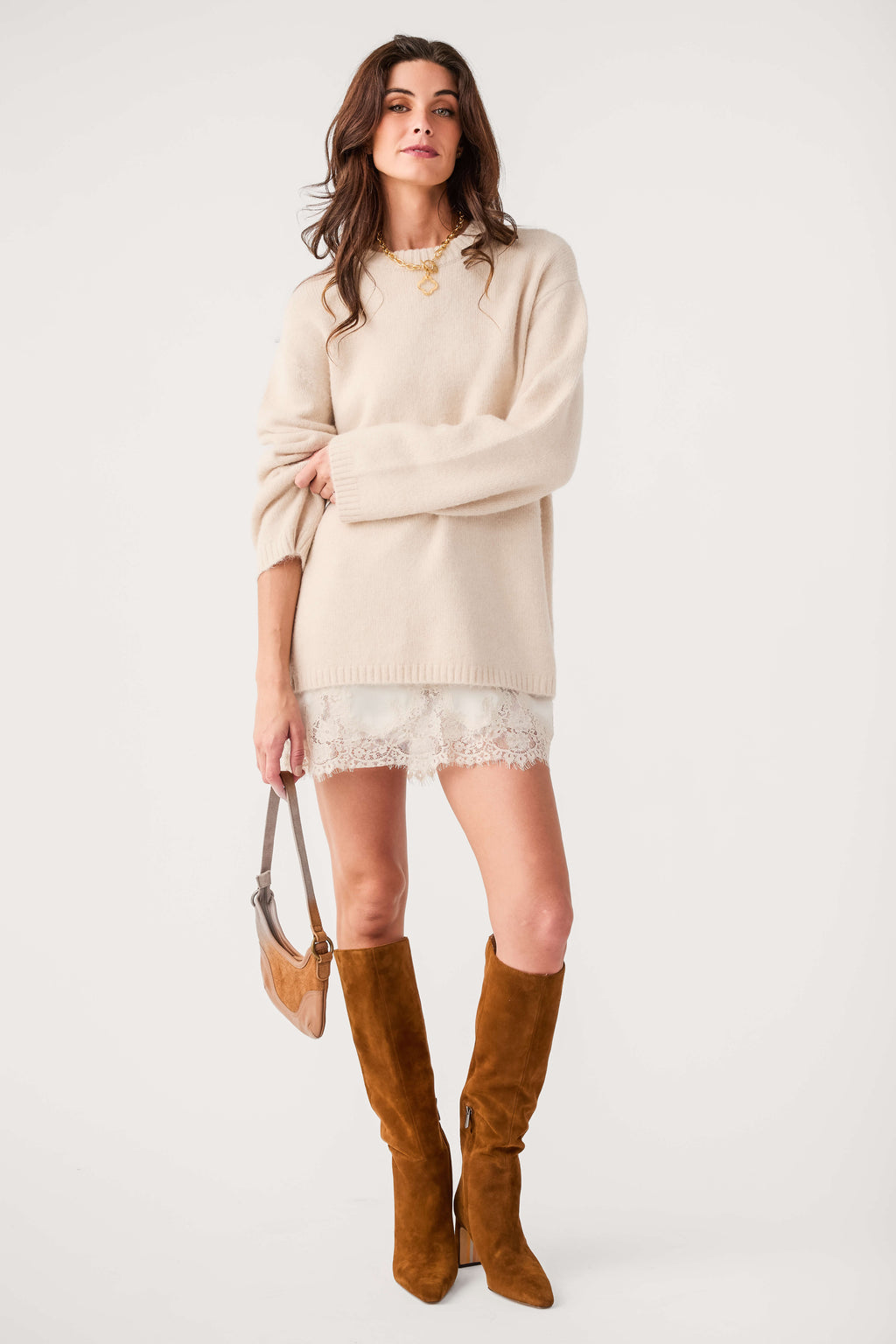 Nutmeg brown knee-high suede boots with pointed toe and stacked heel