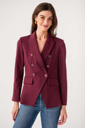 Burgundy double-breasted blazer with notch lapels and four-button front