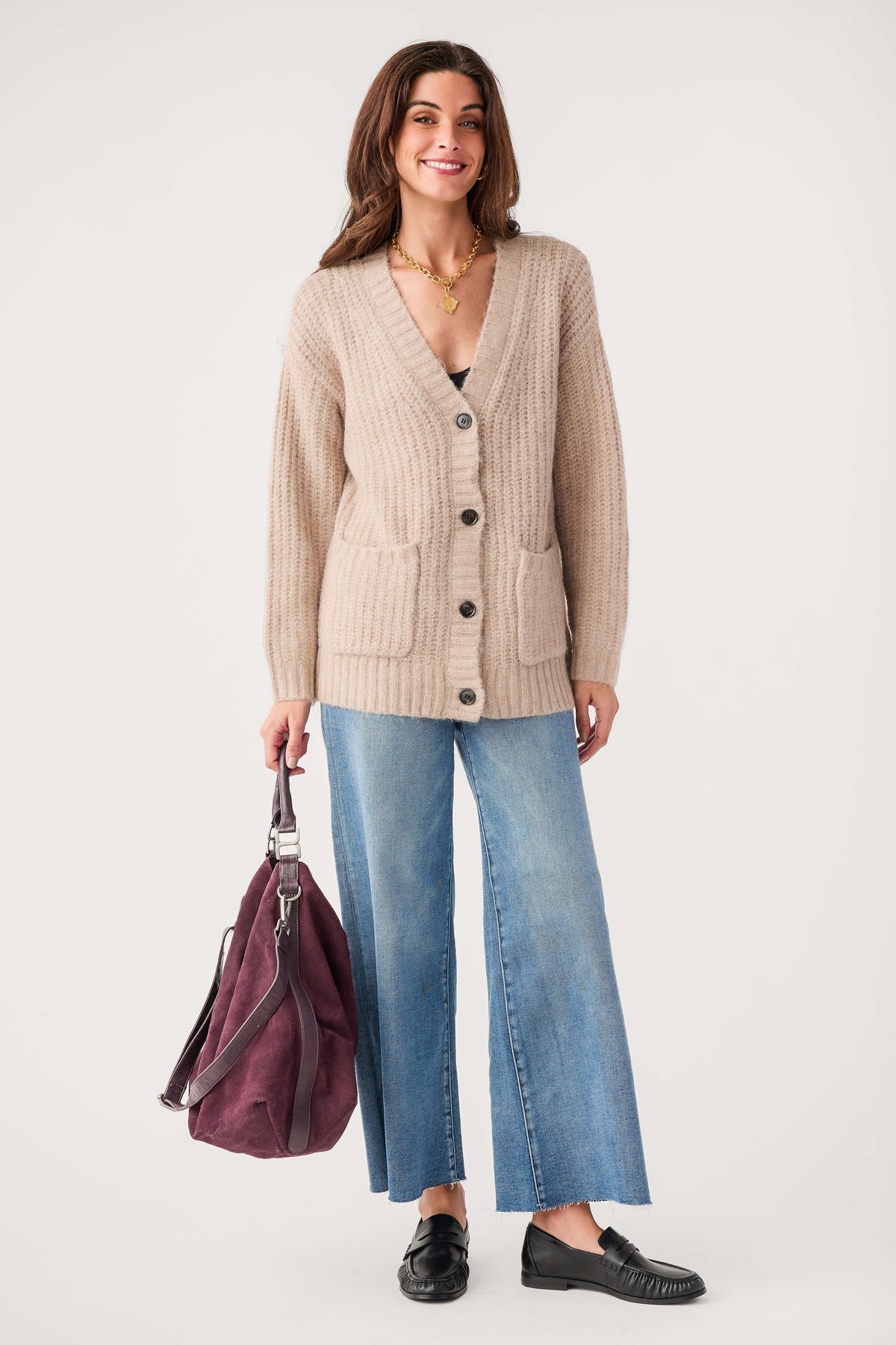 Light khaki knit cardigan with button front, V-neck, and patch pockets