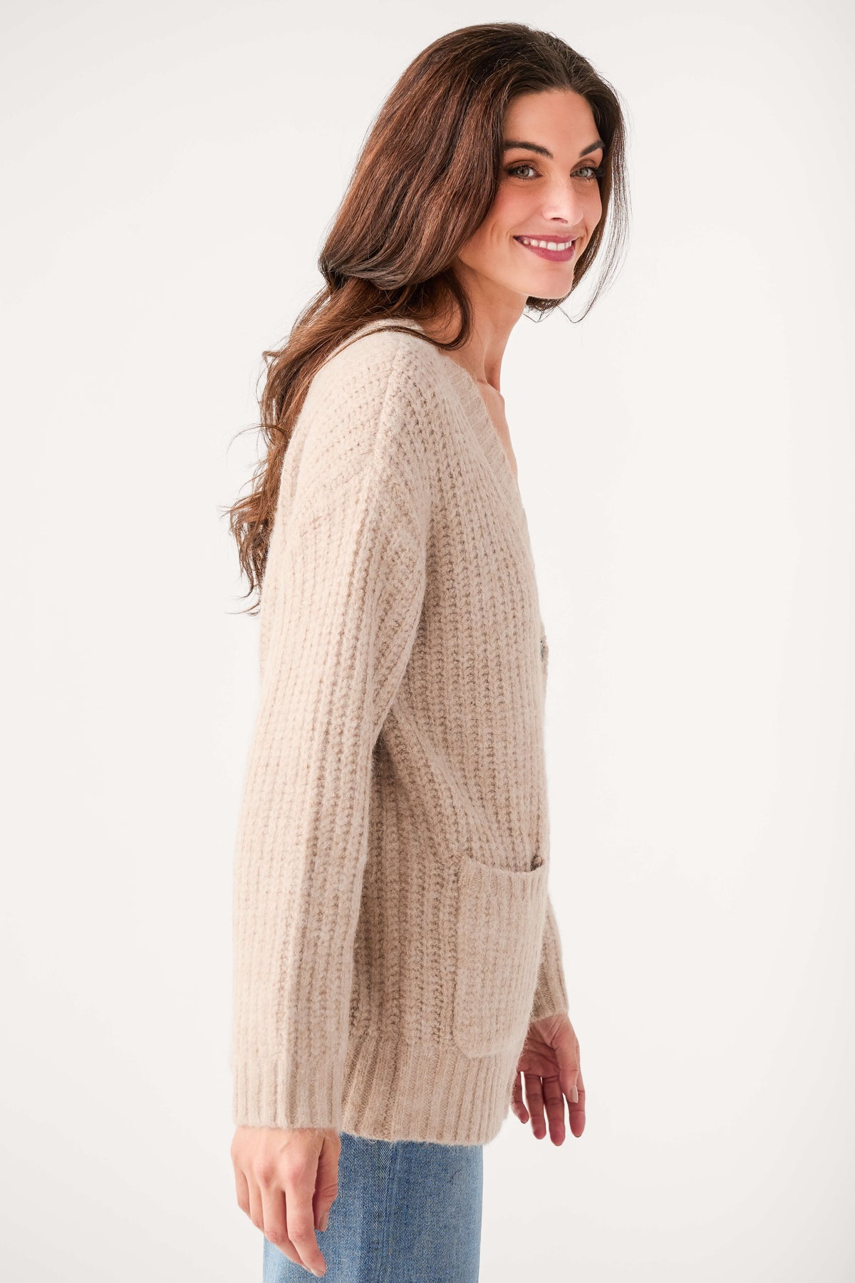 Light khaki knit cardigan side view with ribbed cuffs and hem