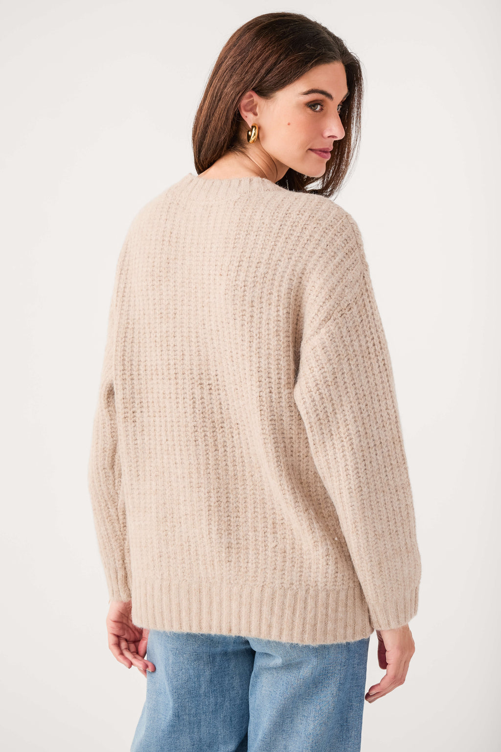 Light khaki knit cardigan back view with ribbed hem and long sleeves
