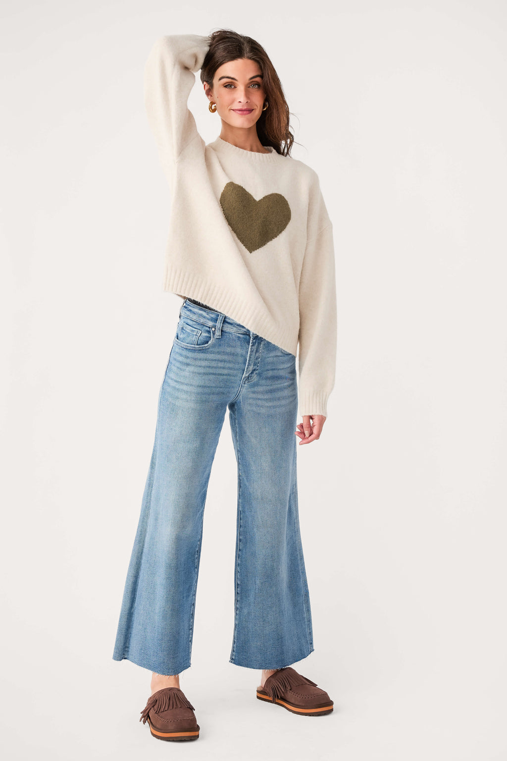 Cream heart graphic sweater with crew neck and long sleeves