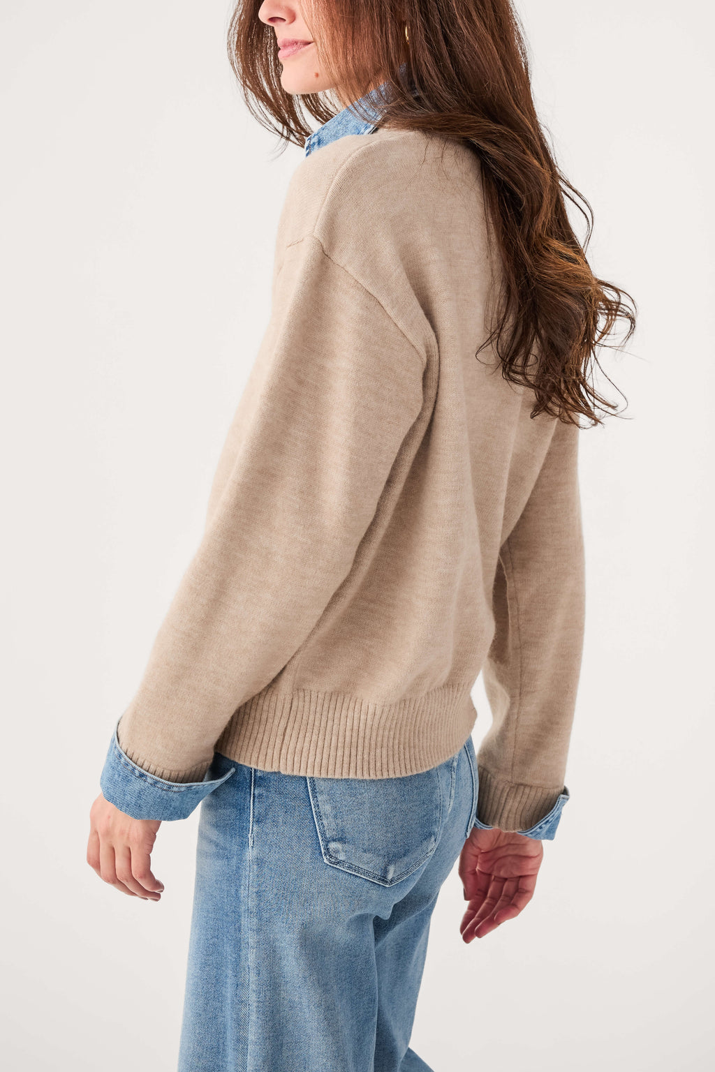 Khaki polo knit sweater with contrast blue cuffs and collar, side view, long sleeves