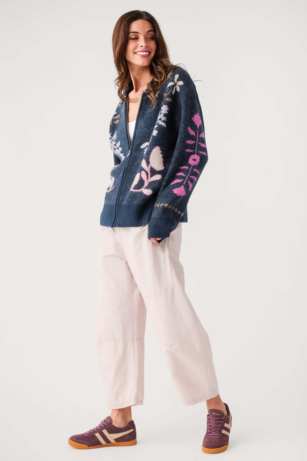 Navy zip-up cardigan with pink and white floral pattern, long sleeves
