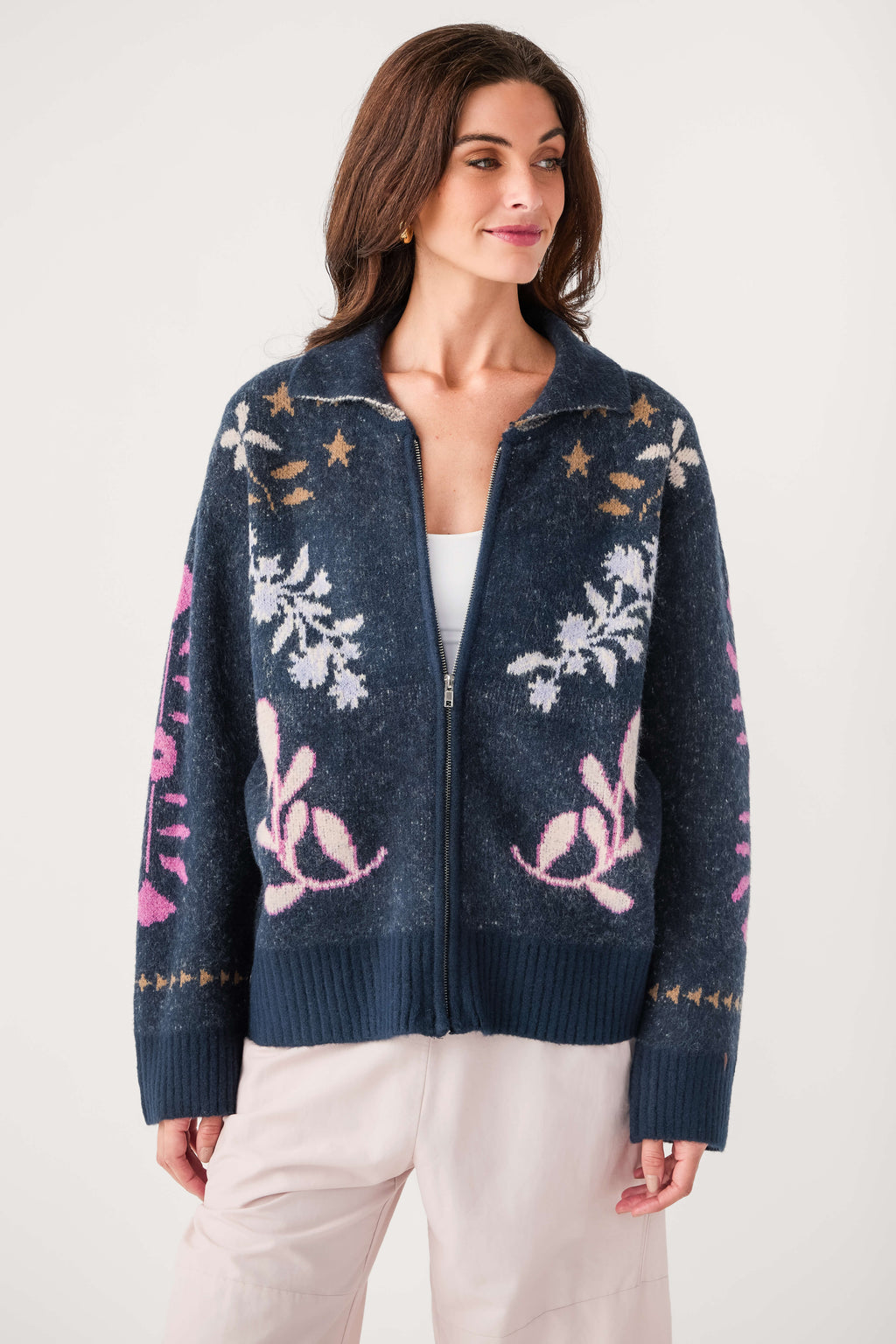 Navy floral zip-up cardigan with star and snowflake motifs, front zipper