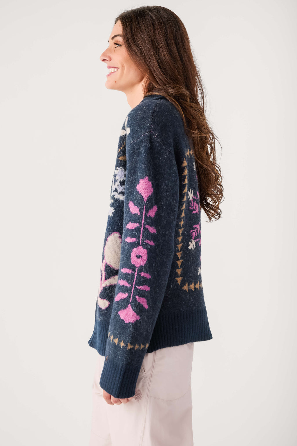 Navy zip-up cardigan with pink floral knit, side view, long sleeves
