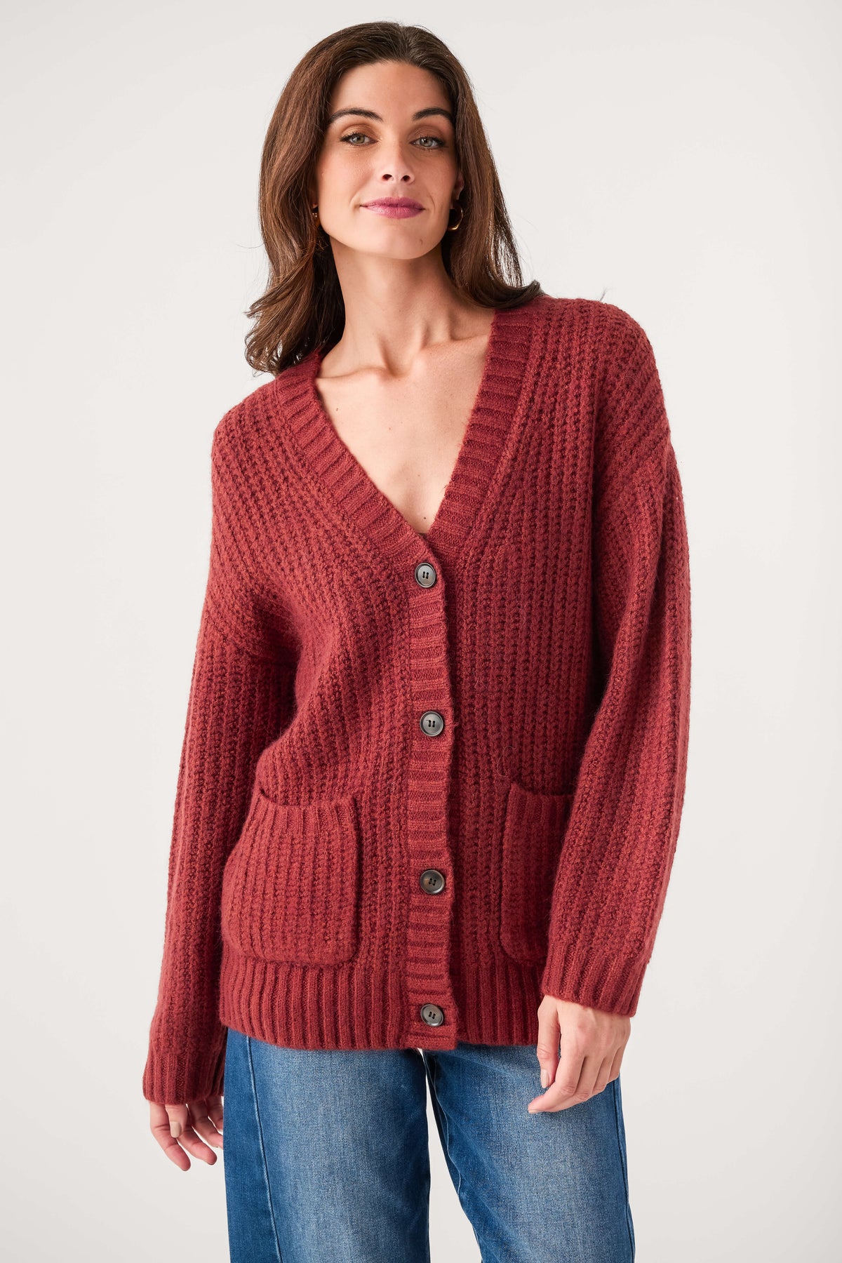 Red V-neck cardigan with button front and two chest patch pockets
