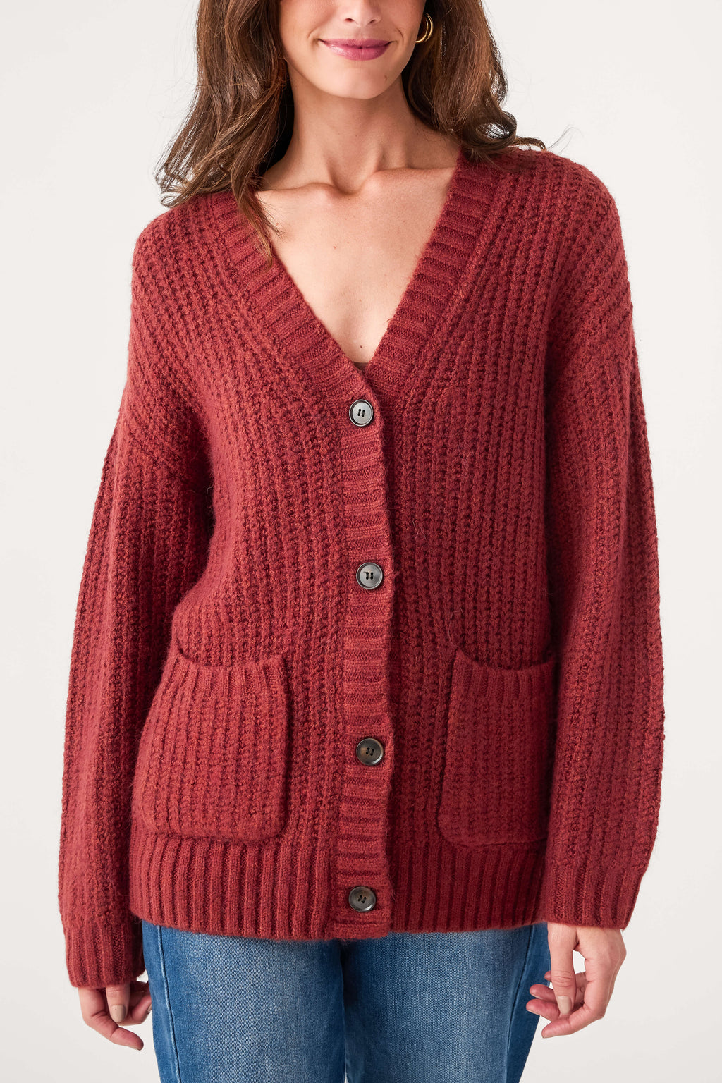 Red button cardigan with patch pockets and ribbed cuffs and hem