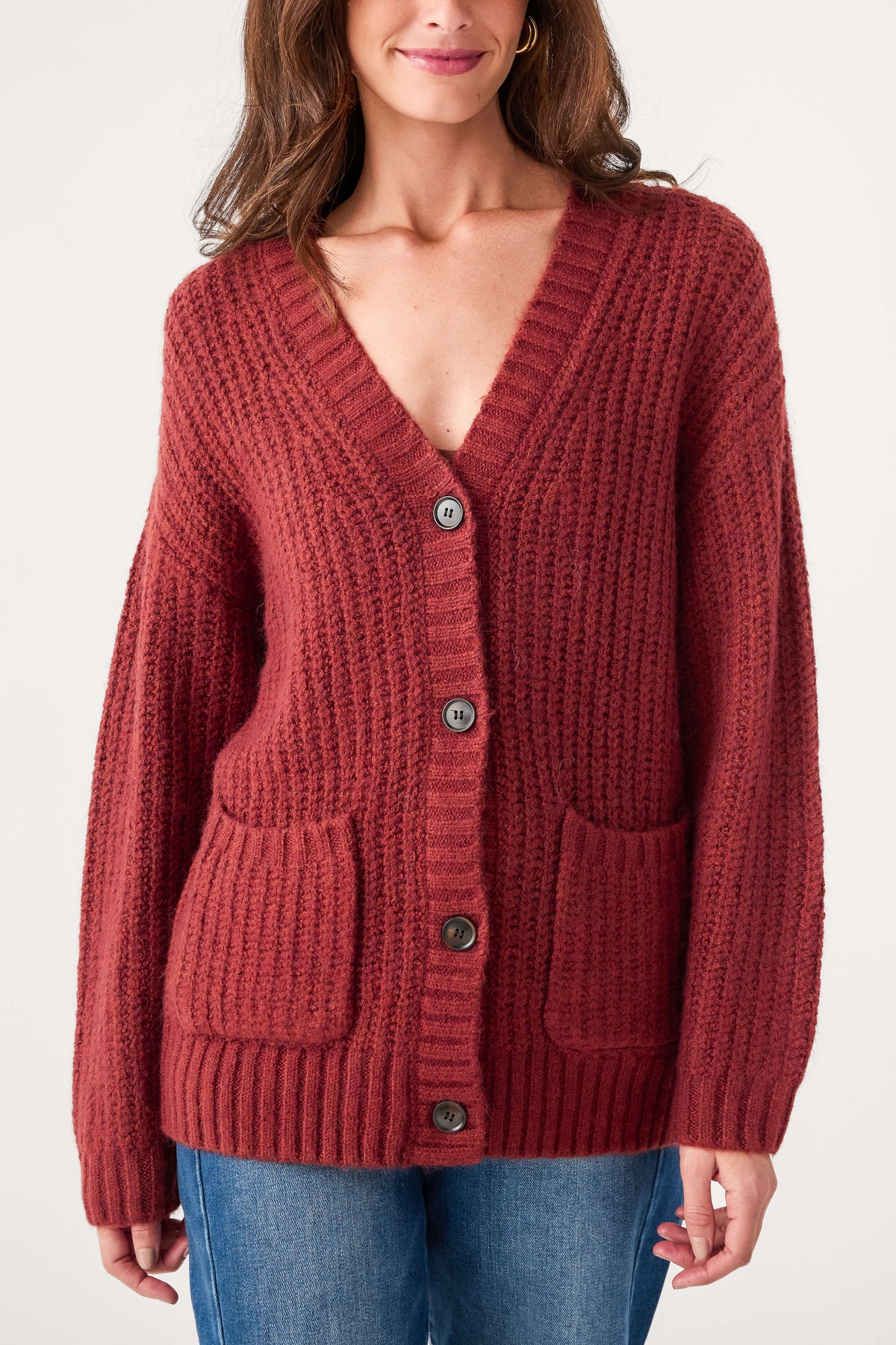 Red button cardigan with patch pockets and ribbed cuffs and hem