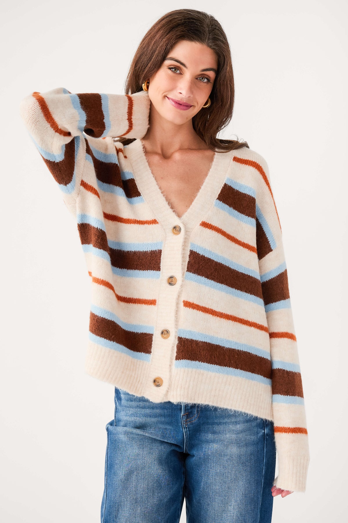 Striped V-neck cardigan, cream base with brown, blue, and orange horizontal stripes and buttons