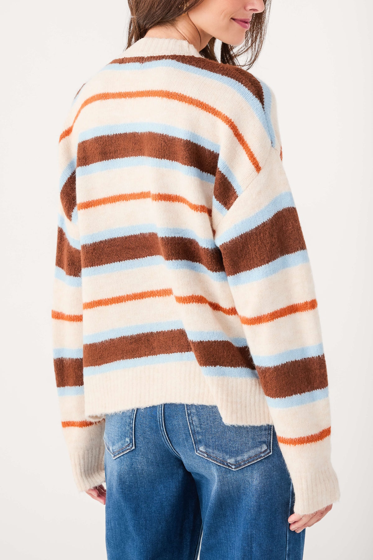 Striped cardigan back with long sleeves in cream, brown, blue, and orange horizontal stripes