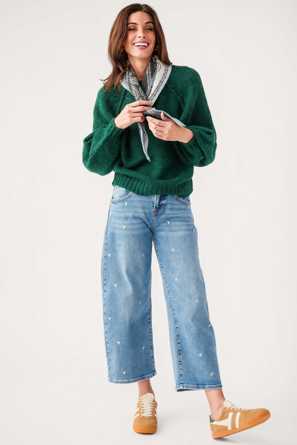 Light blue cropped barrel jeans with speckled embroidery and five-pocket styling