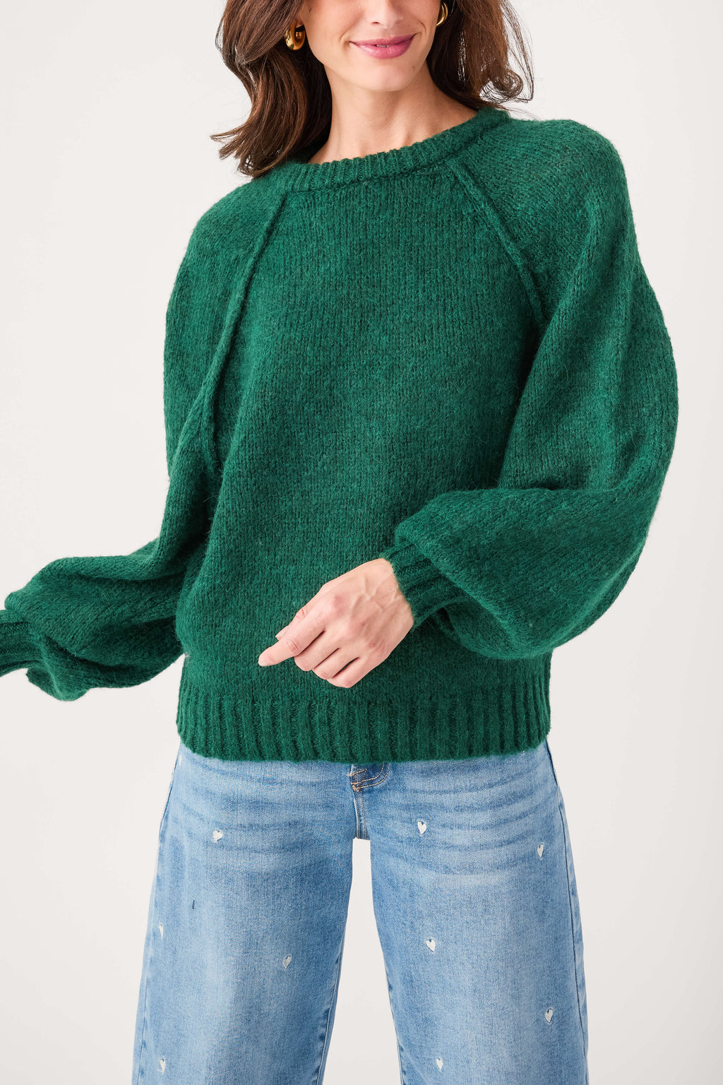 Forest green raglan sleeve sweater, textured knit with ribbed cuffs and hem