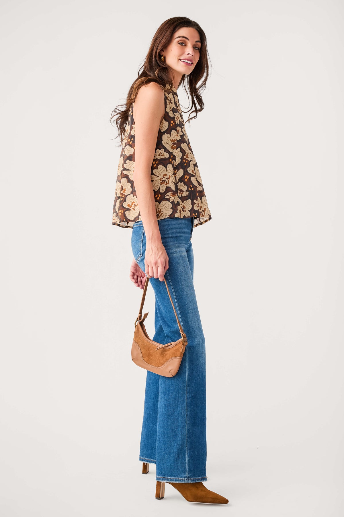 Brown sleeveless floral tie top, side view with flowy hem