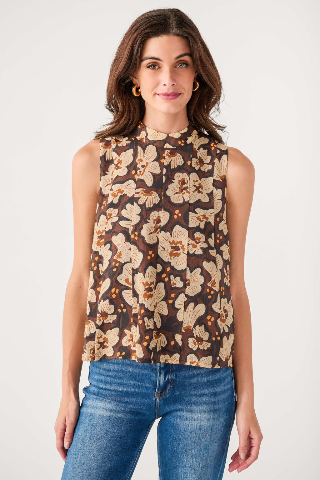 Brown floral sleeveless tie top with high neckline and buttonless front
