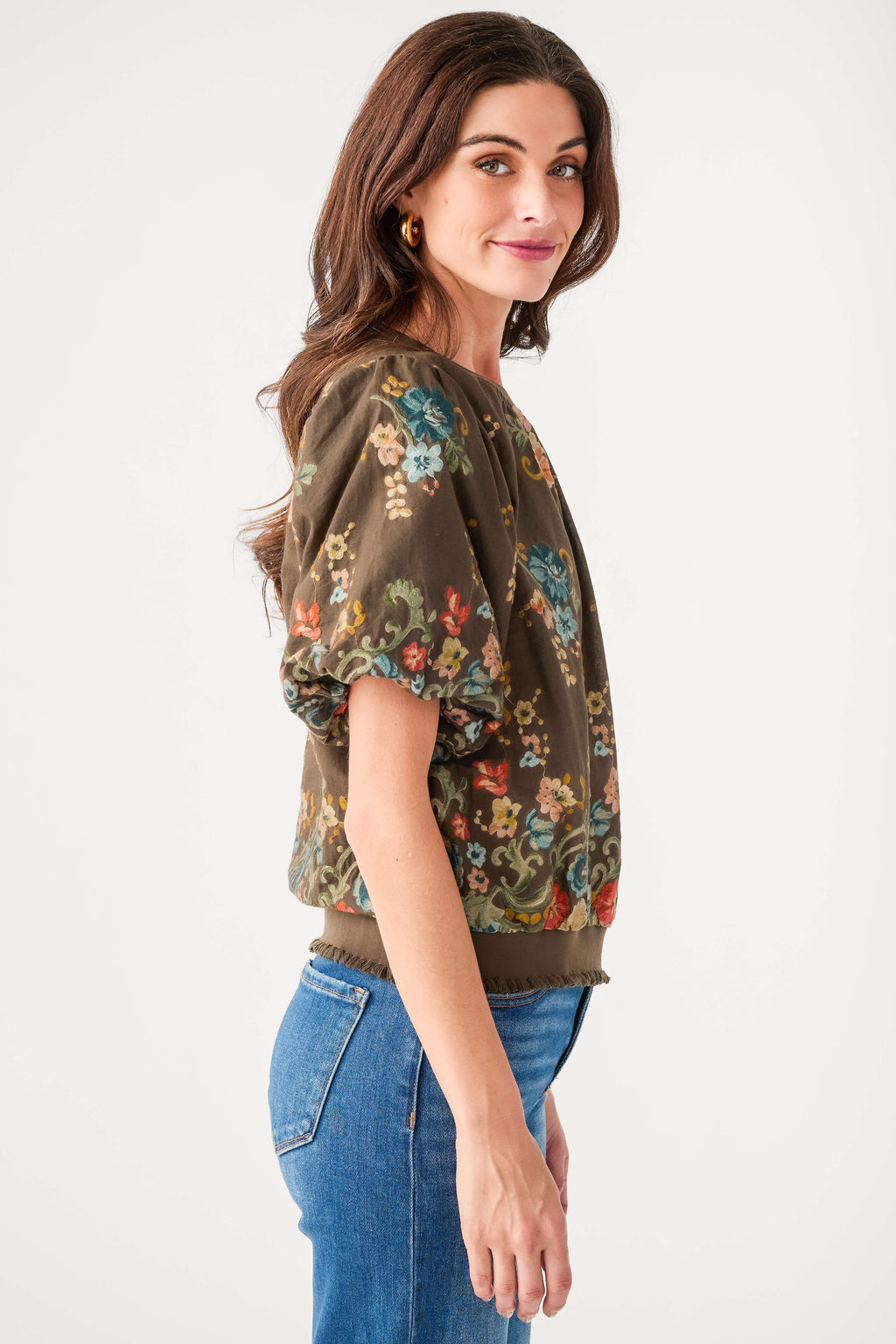 Dark brown embroidered floral blouse with puff sleeves and gathered cuff hem