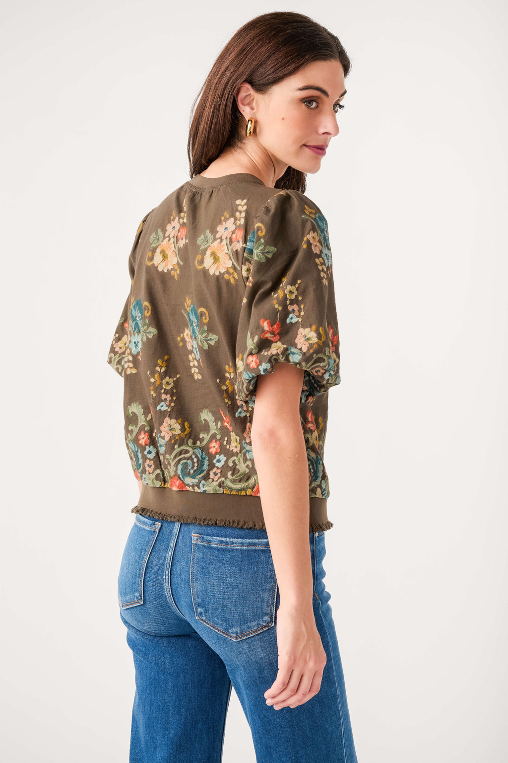 Dark brown embroidered floral top with short puff sleeves from side-back view