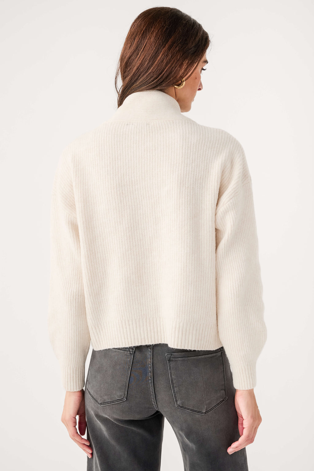 Cream knit shawl-collar sweater with ribbed cuffs and hem, back view