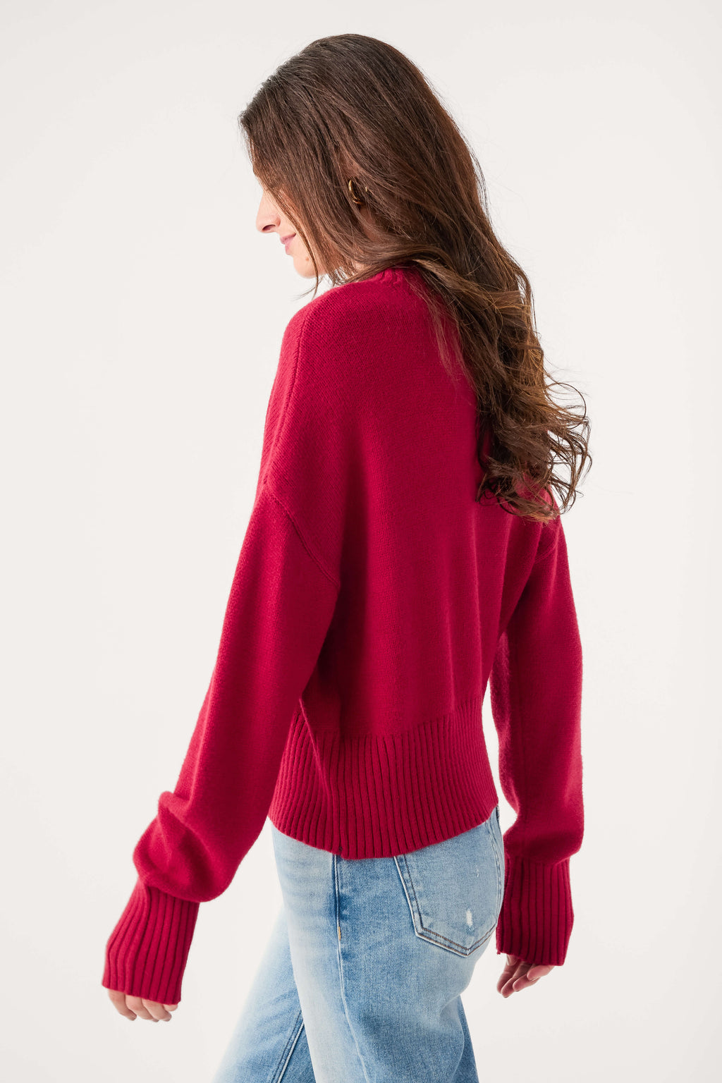 Wine mock neck sweater, side view with ribbed knit cuffs and hemline